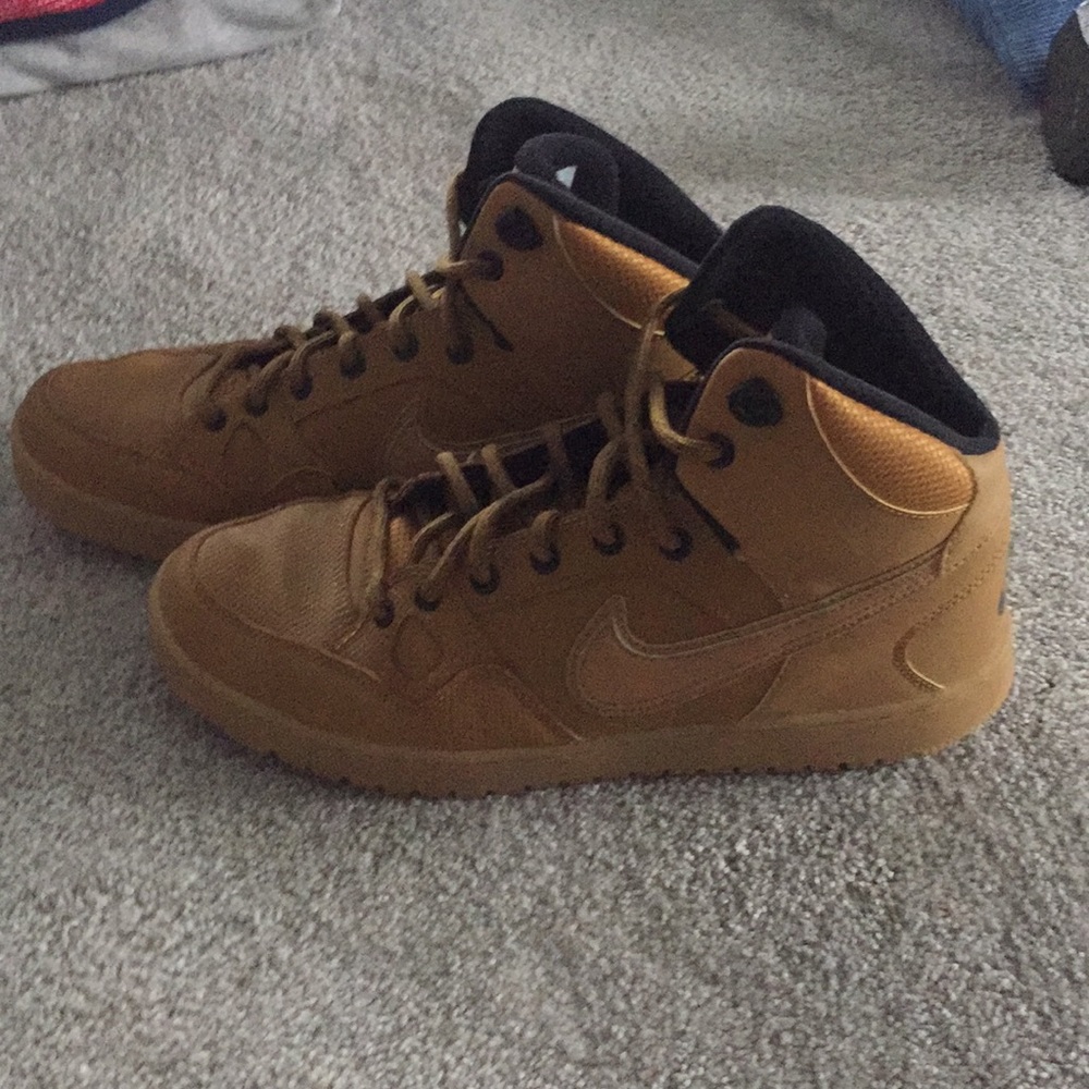 Tan Nike Air Force Hightop shoes